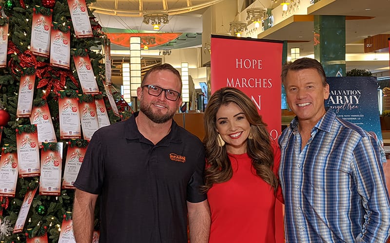 BFarr Contracting & WKMG Anchor Lisa Bell of Local 6 News and WKMG Chief Meteorologist Tom Sorrels Gathered by Salvation Army Angel Tree